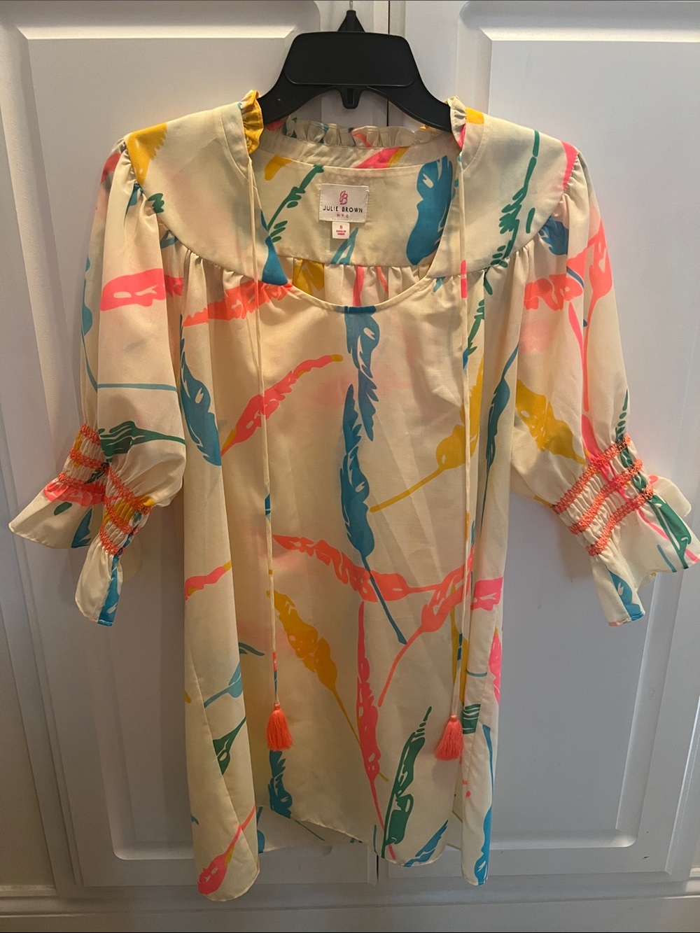 JB by Julie Brown Cream Dress with Coral, Teal, Yellow & Green Feather Print